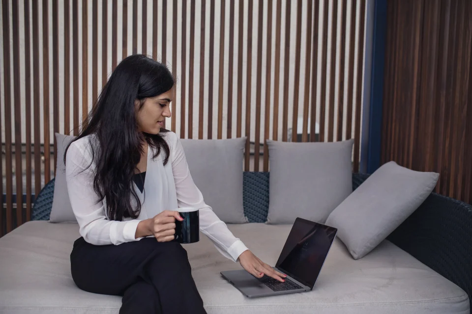 Woman reviewing an email marketing campaign on her laptop