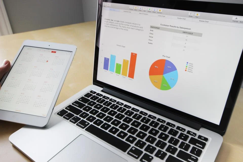 Performance marketing report with colourful charts on a laptop