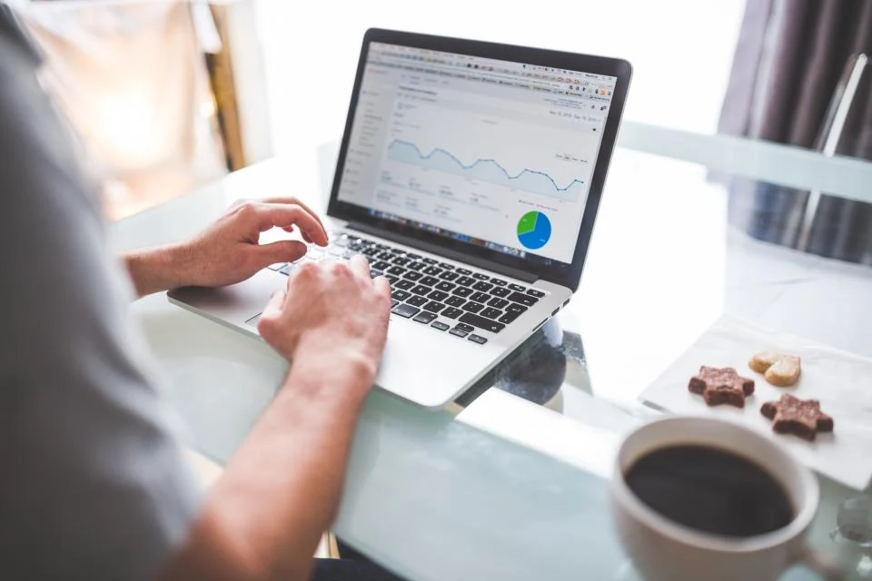 SEO analytics dashboard open on a laptop screen